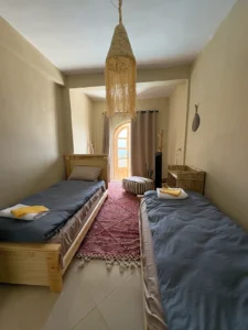 Surfcamp Double Room at Taghazout Surf Villa with sea view and direct pool access for all-inclusive Moroccan surf stay
