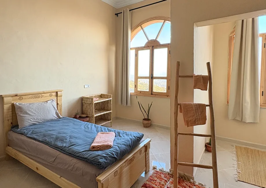 Shared Bedroom at Taghazout Surf Villa with sea view and direct pool access for all-inclusive Moroccan surf stay