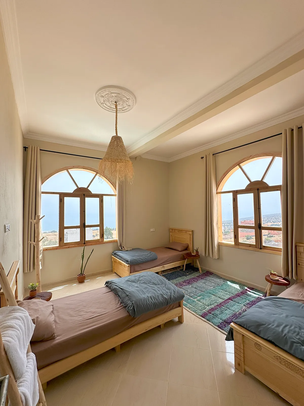 Shared Bedroom at Taghazout Surf Villa with sea view and direct pool access for all-inclusive Moroccan surf stay