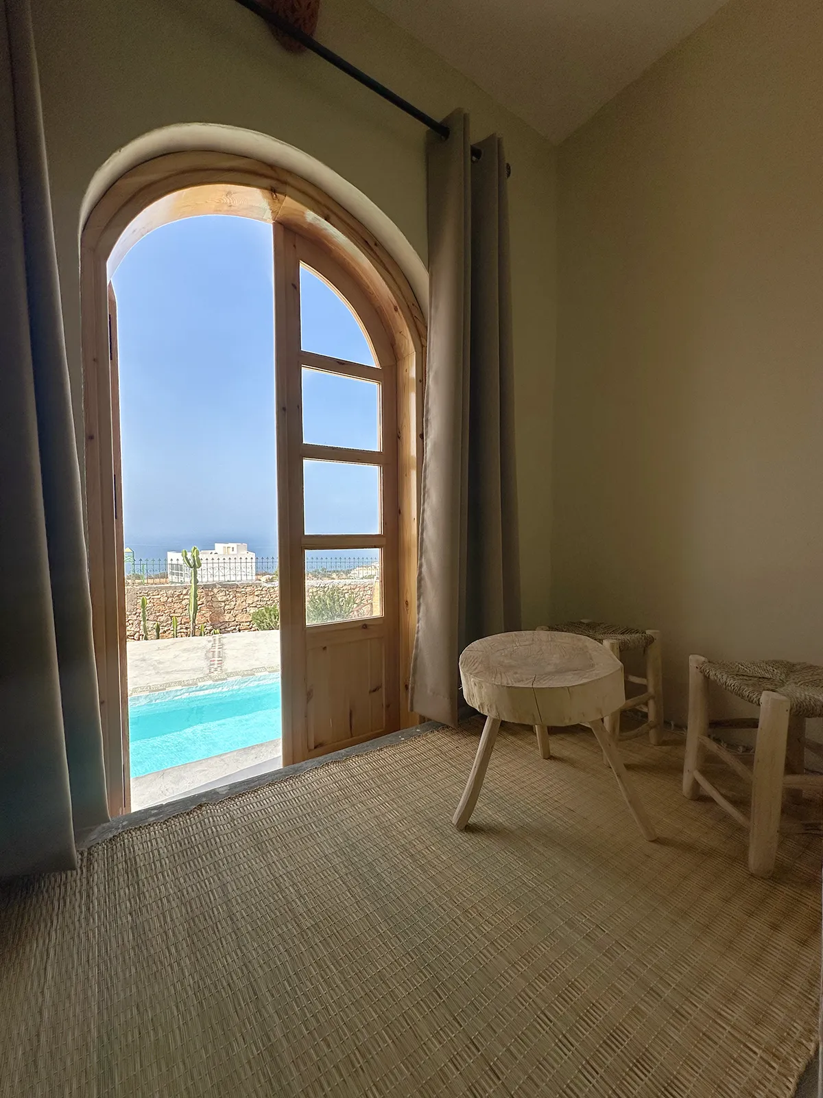 Private room at Taghazout Surf Villa with sea view and direct pool access for all-inclusive Moroccan surf stay